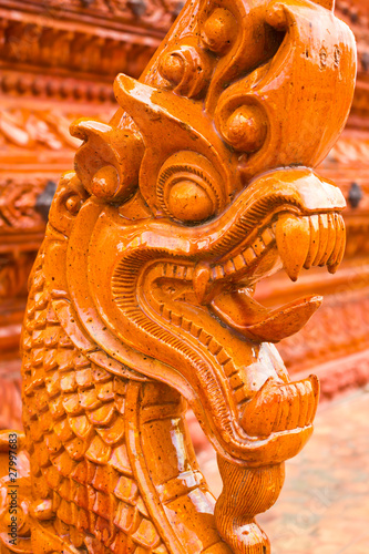 ancient naga starue in thai temple photo