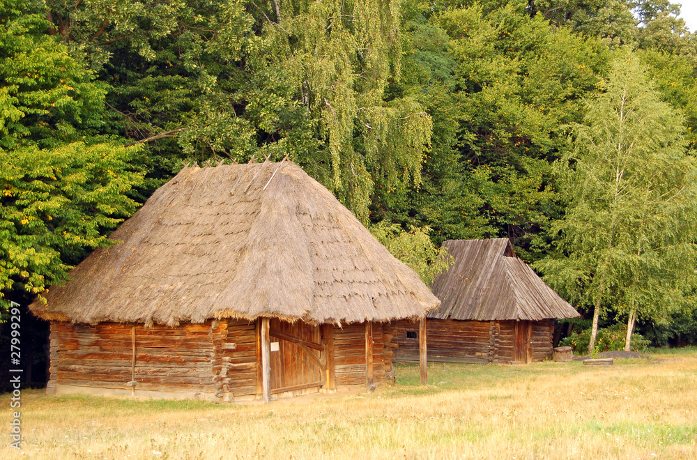 Ancient traditional ukrainian rural barn with a straw roof Ancient traditional ukrainian rural barn with a straw roof