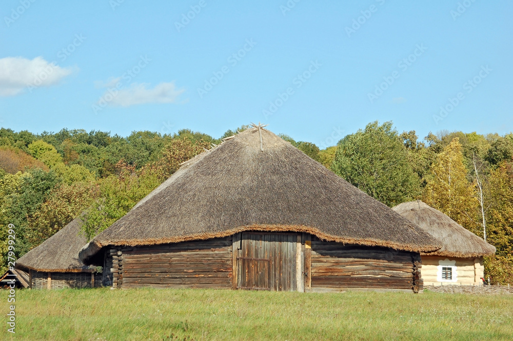 Ancient traditional ukrainian rural barn with a straw roof Ancient traditional ukrainian rural barn with a straw roof