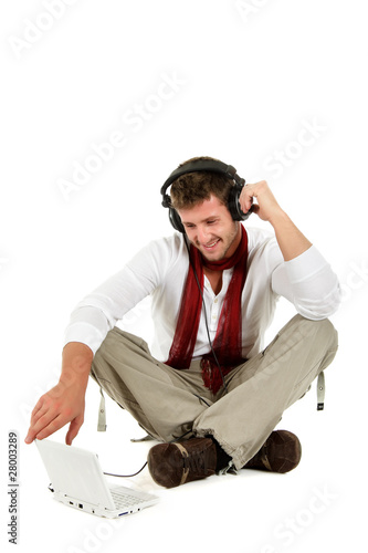 Handsome young caucasian man, music listening