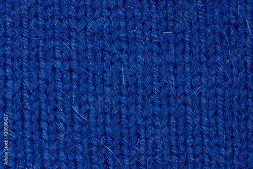 Blue knitting background of handmade woolen pattern
