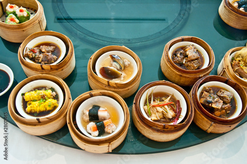 The Variety of dim sum in bamboo steam containers photo