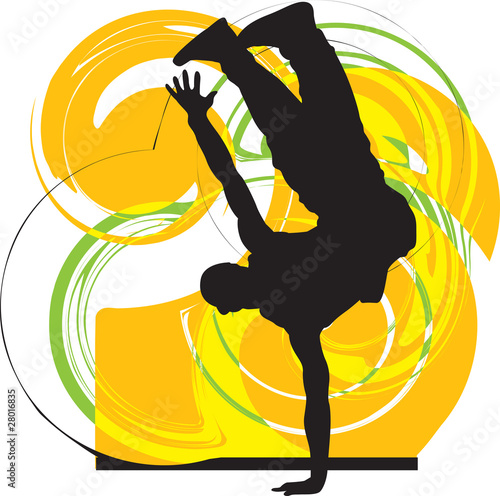 Breakdancer dancing on hand stand silhouette