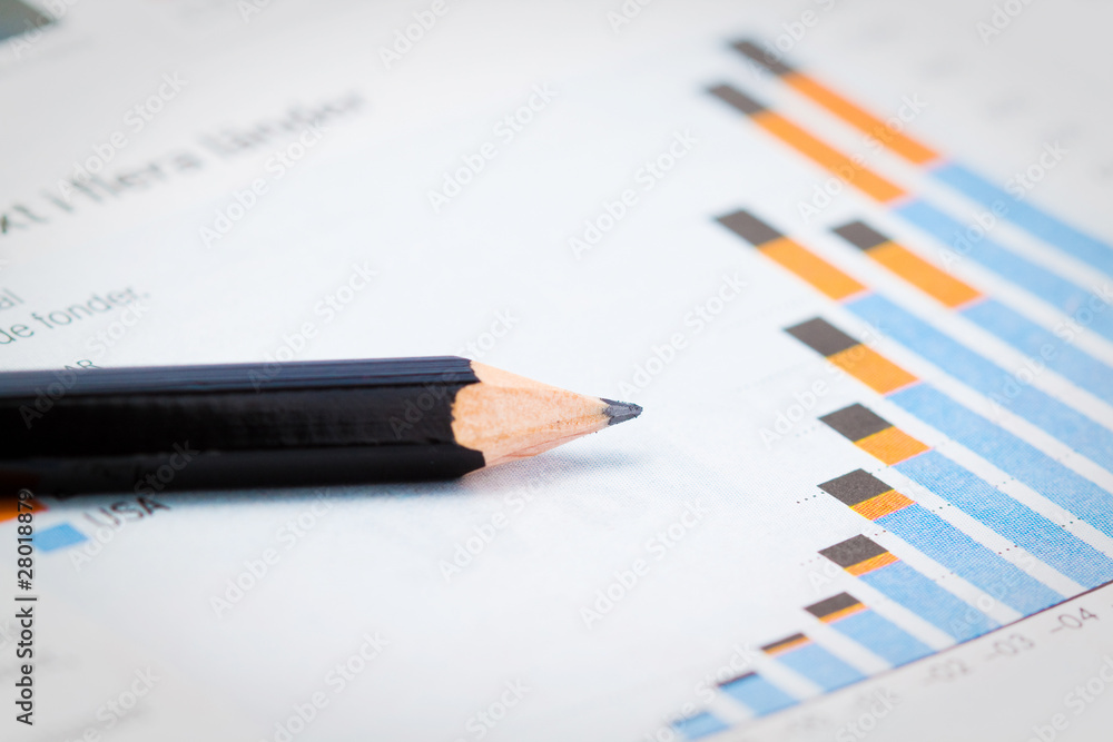 pencil showing a diagram in newspaper pencil showing a diagram in newspaper