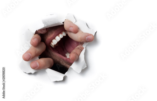 Vászonkép A man shouting through a hole