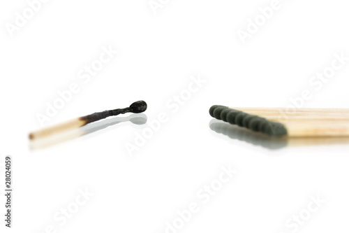 burnt match and whole matches