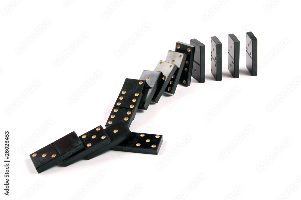 stack of dominoes falling on white background stack of dominoes falling on white background