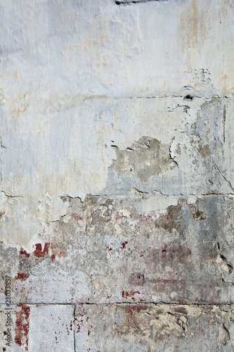 Weathered wall with bloody stains