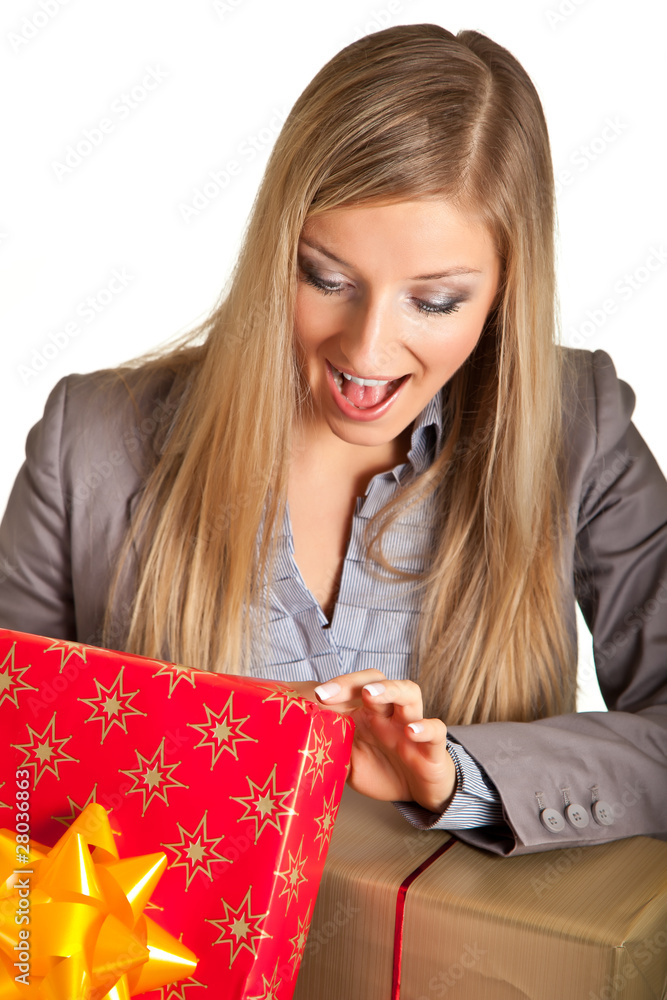 Blond caucasian woman in formal dress with gift boxes isolated Blond caucasian woman in formal dress with gift boxes isolated
