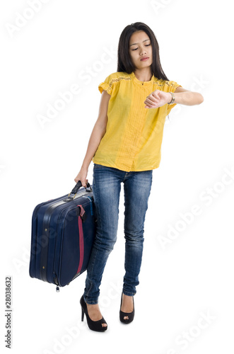 pretty woman with bag checking time