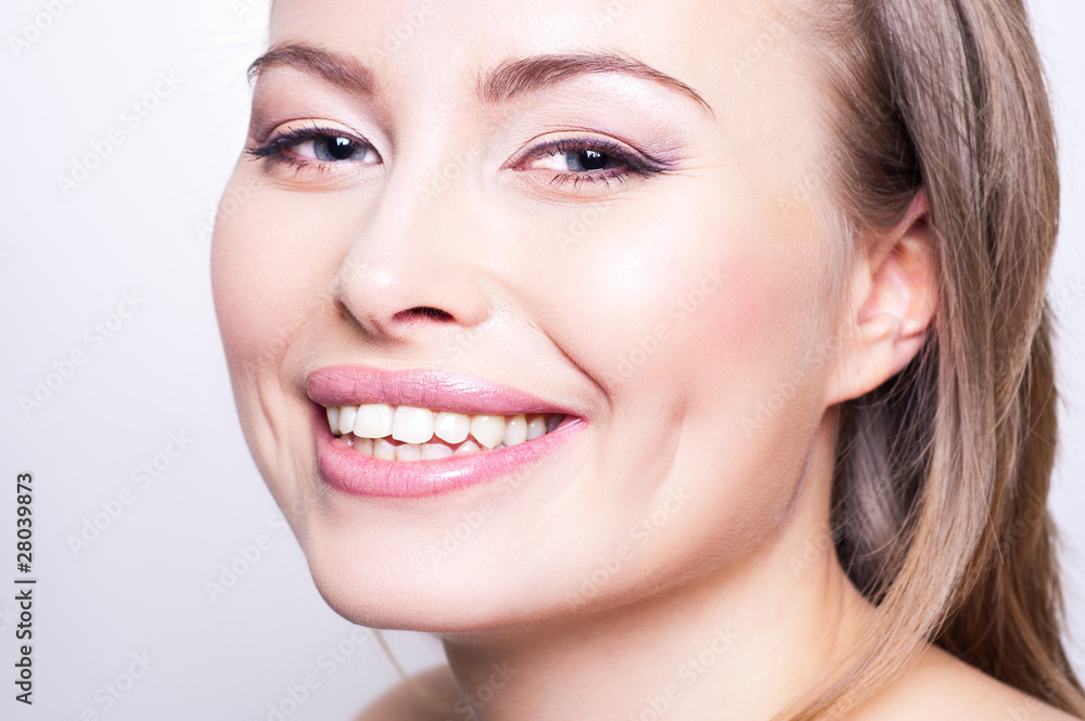 Obraz premium Attractive happy young woman portrait on white background