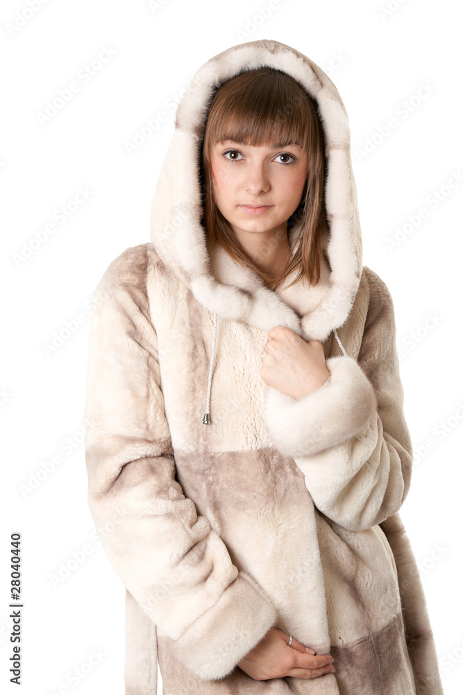 A beautiful young girl in a fur coat A beautiful young girl in a fur coat