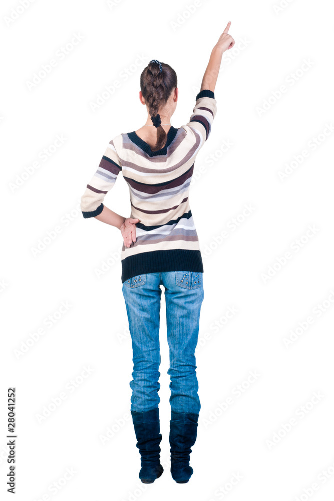 Beautiful young woman pointing . Rear view. Beautiful young woman pointing . Rear view.