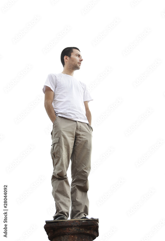 Young man standing on a pole Young man standing on a pole