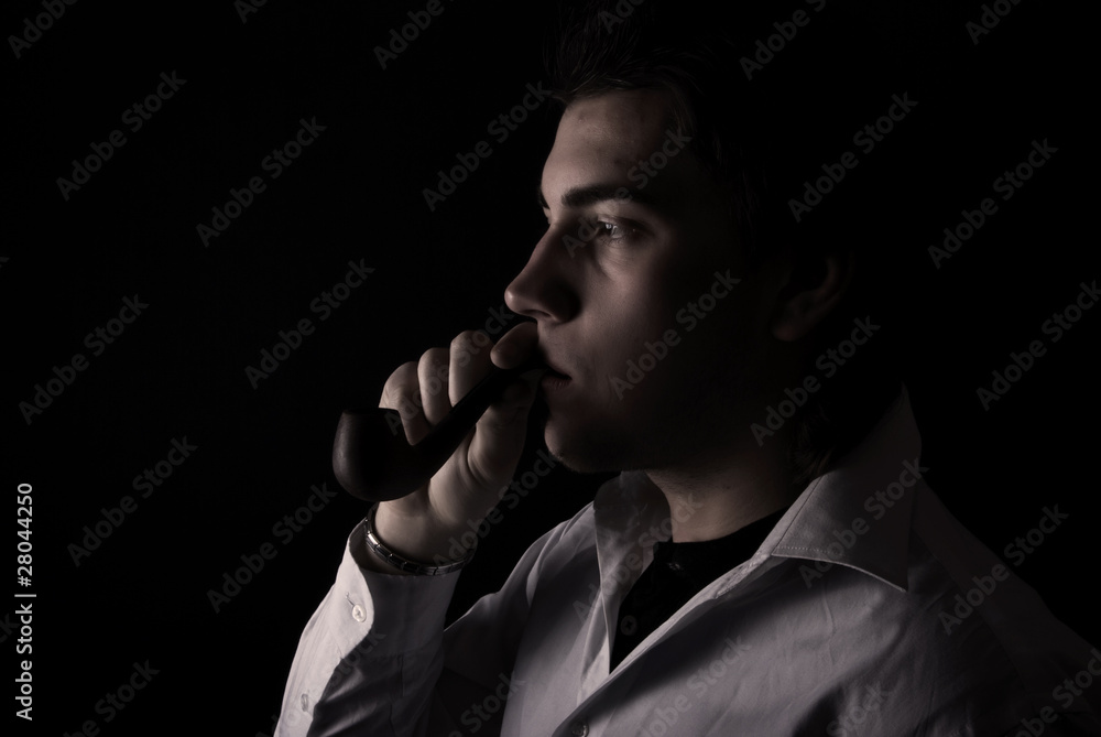 portrait of a young man with pipe portrait of a young man with pipe