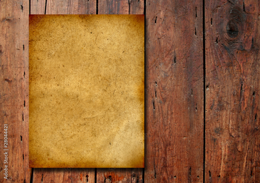 Old paper over an old wood background Old paper over an old wood background