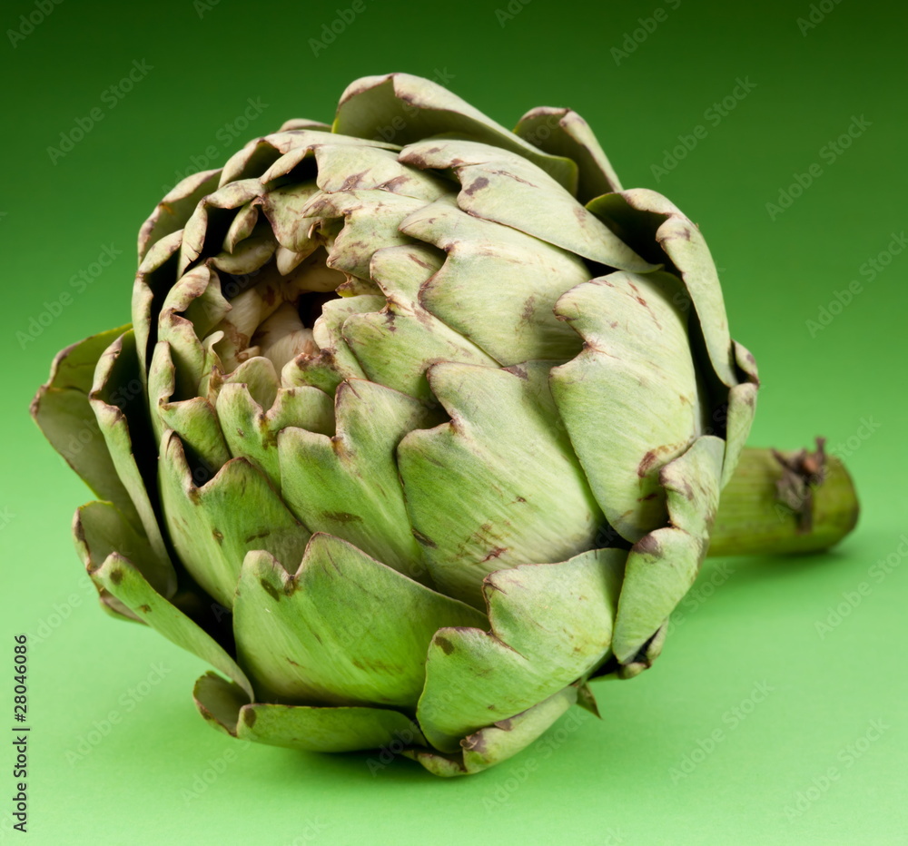 Fototapeta premium Artichoke on a green background