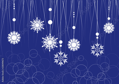 decorazione di natale con fiocchi di neve su fondo blu