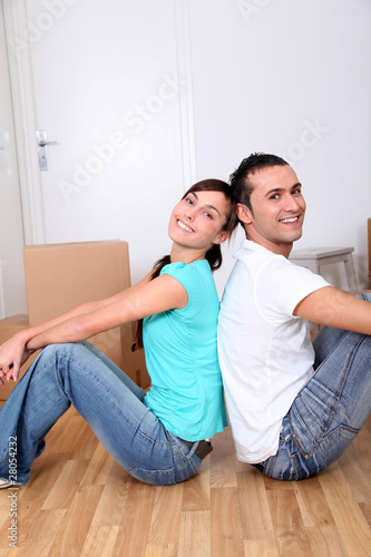 Young couple moving in new house