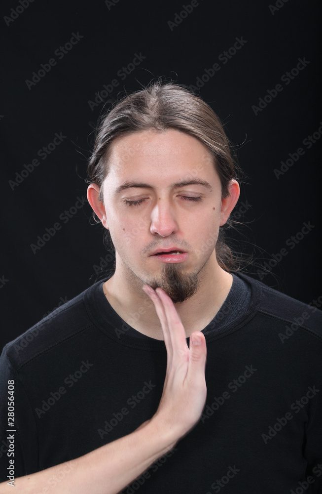 Slap in the face of young caucasian man Slap in the face of young caucasian man