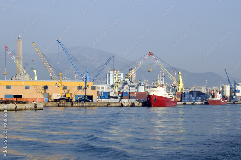 Naklejka premium Boat in Genoa Harbor, Italy