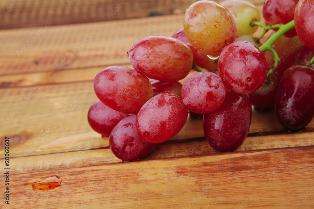 red grape on wood red grape on wood