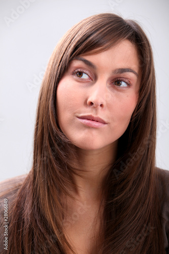 Closeup of beautiful young woman with long hair