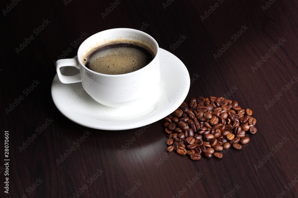 Fototapeta premium cup with coffee and coffee beans