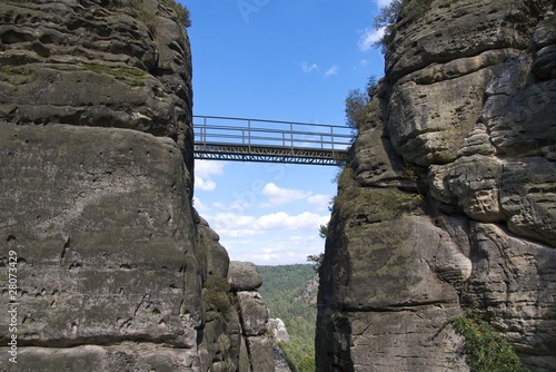 Bridge connecting rocks of Felsenburg (Rock Castle) Neurathen photo