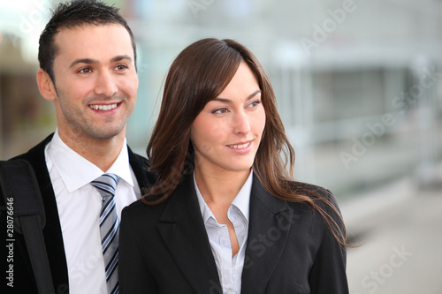 Portrait of business people standong outside the airport