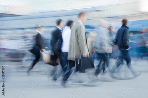 Принти на полотні Motion blurred people rushing to work