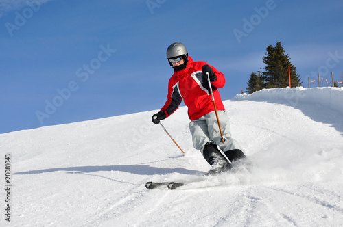 Young boy skiing on mountains