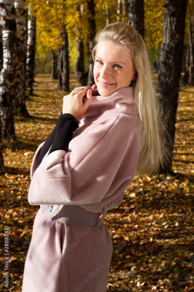 Beautiful russian girl in the autumn park Beautiful russian girl in the autumn park