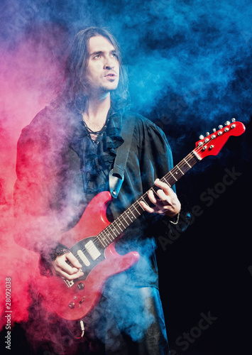 Rock-star playing a concert © kharkov.photo