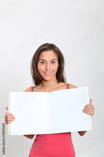 Smiling woman showing message sign