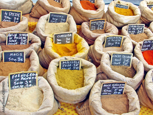 Bags of colorful and piquant spices for sale