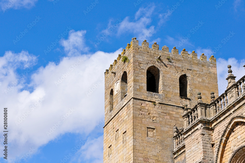 Tower of Sigenza cathedral against a beautiful blue sky