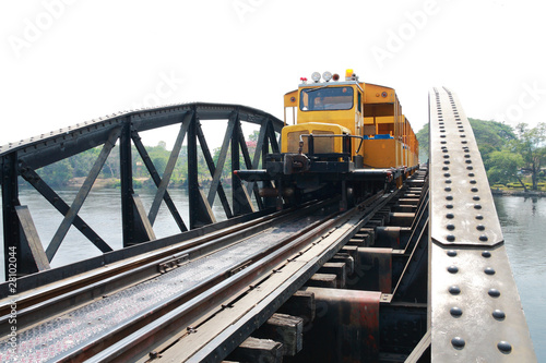 Train on railway bridge cross river