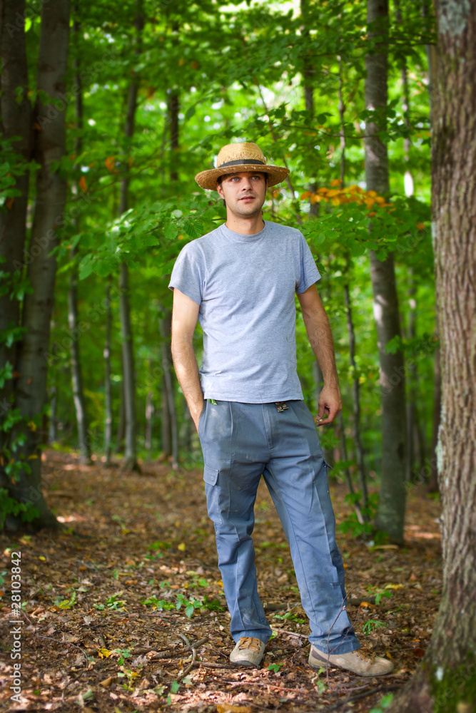 Young farmer with hat outdoor Young farmer with hat outdoor
