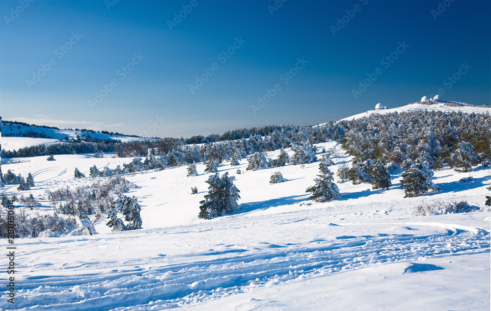 A view on a snowy valley