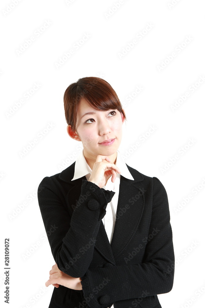 buisiness woman thinks about something buisiness woman thinks about something