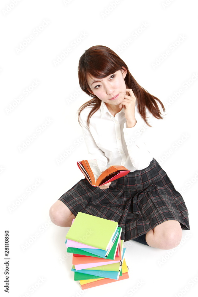 Female student reading a book
