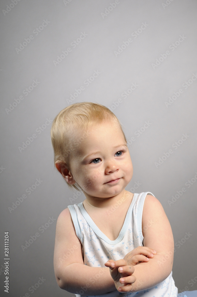 cheerful baby boy playing with hands cheerful baby boy playing with hands