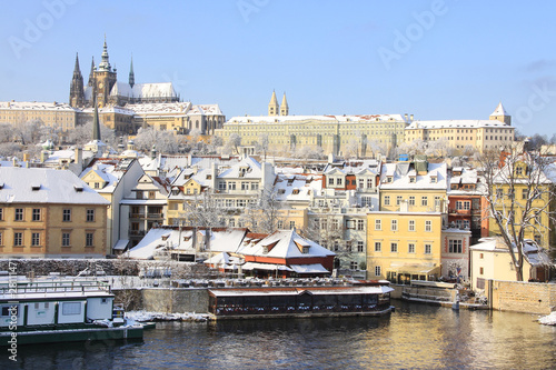 First Snow in Prague, gothic Castle above the River Vltava