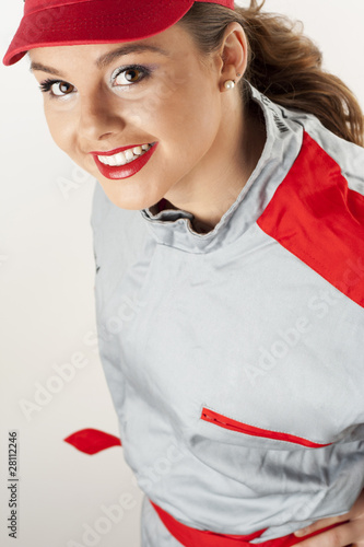 young happy woman wearing mechanics overalls