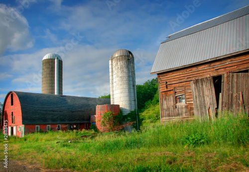 Run Down Barn with Silos in the Background