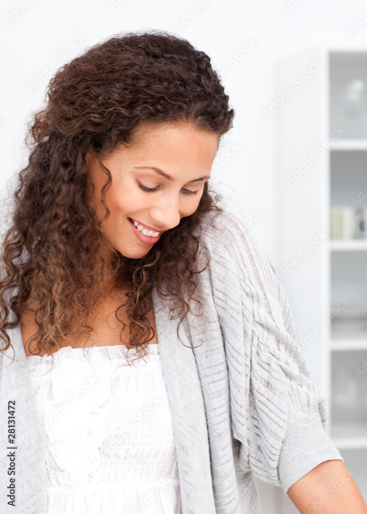 Adorable woman standing in her kitchen Adorable woman standing in her kitchen