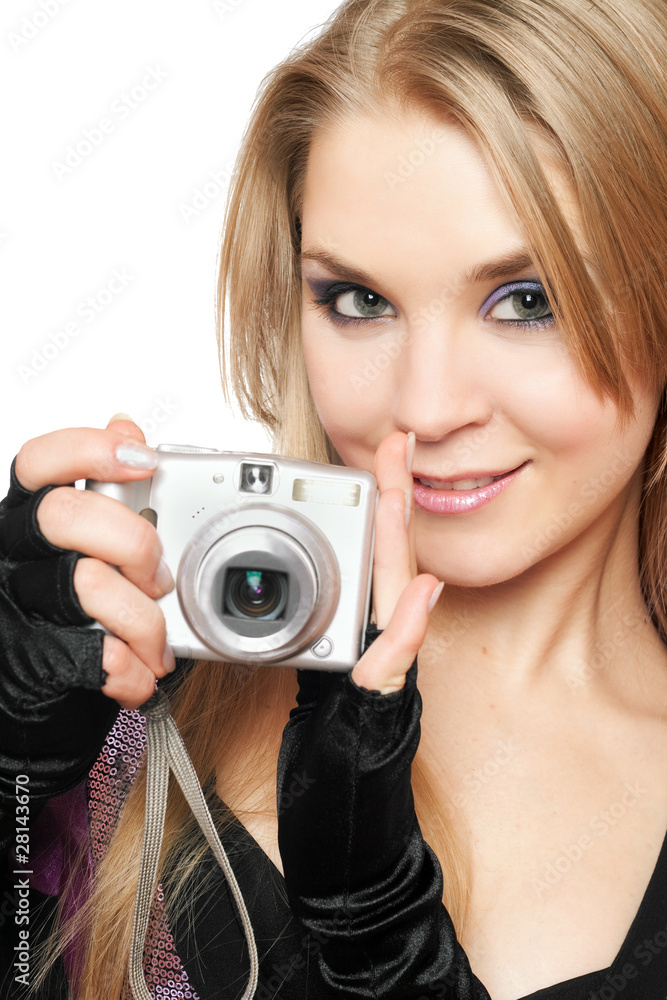 Smiling beautiful blonde holding a photo camera Smiling beautiful blonde holding a photo camera