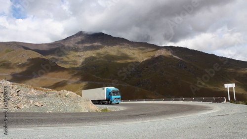 Winding road. Car on a bend.