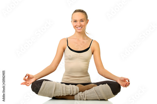 Portrait of smiling young girl practicing yoga